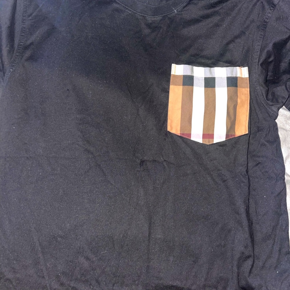 The shirt has a whole in the middle but it’s fixable with needle and thread 🪡